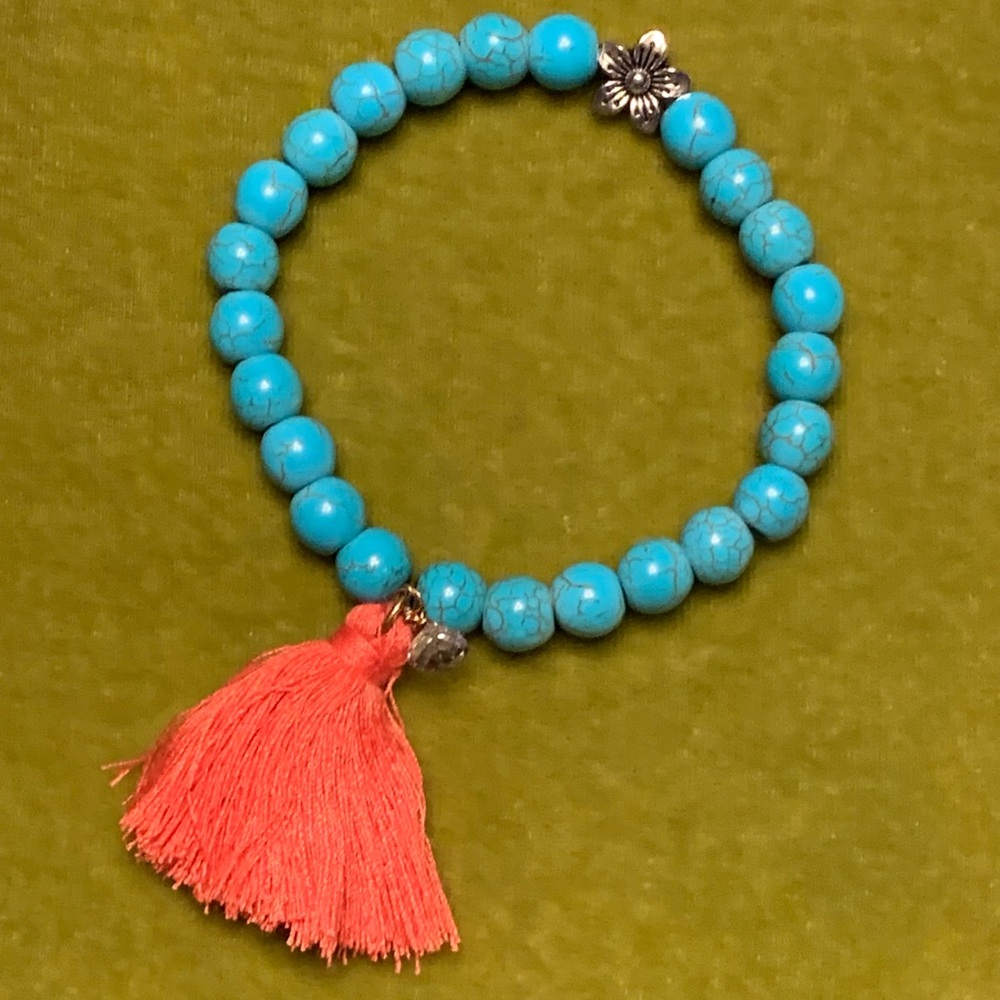Howlite Beaded Bracelet with Coral Tassel Accent and Amethyst Briolette